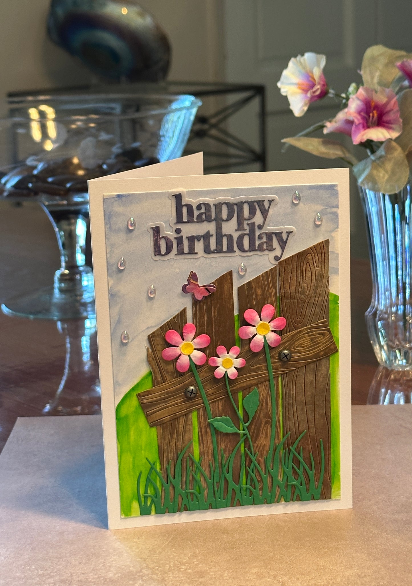 Birthday card with Wood Fence, Pink Flowers and Grass