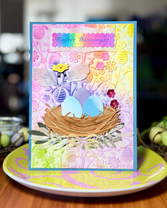 Easter card with nest, easter eggs and a tiny chick