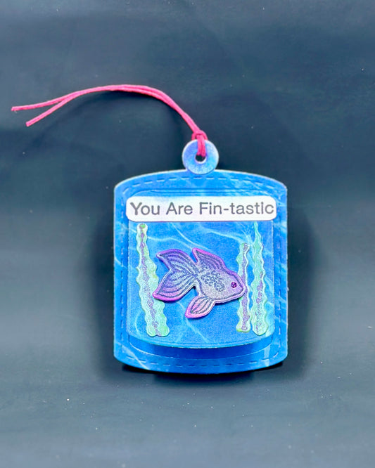 Peek-a-boo gift tag featuring a cute and colorful, irridescent fish.